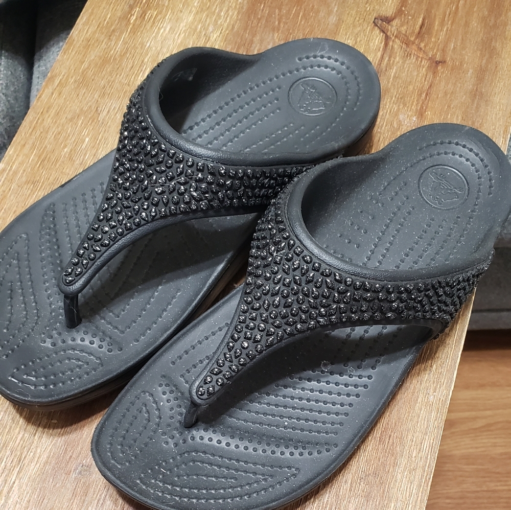Black croc flip flops